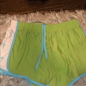 Green beach shorts